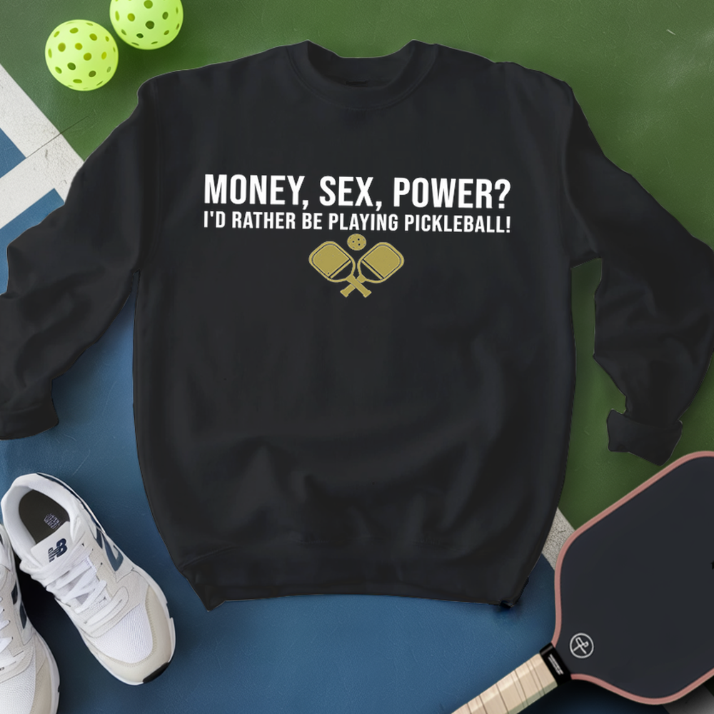 Black sweatshirt with pickleball-themed text and graphics on a green and blue background with pickleballs and a paddle.