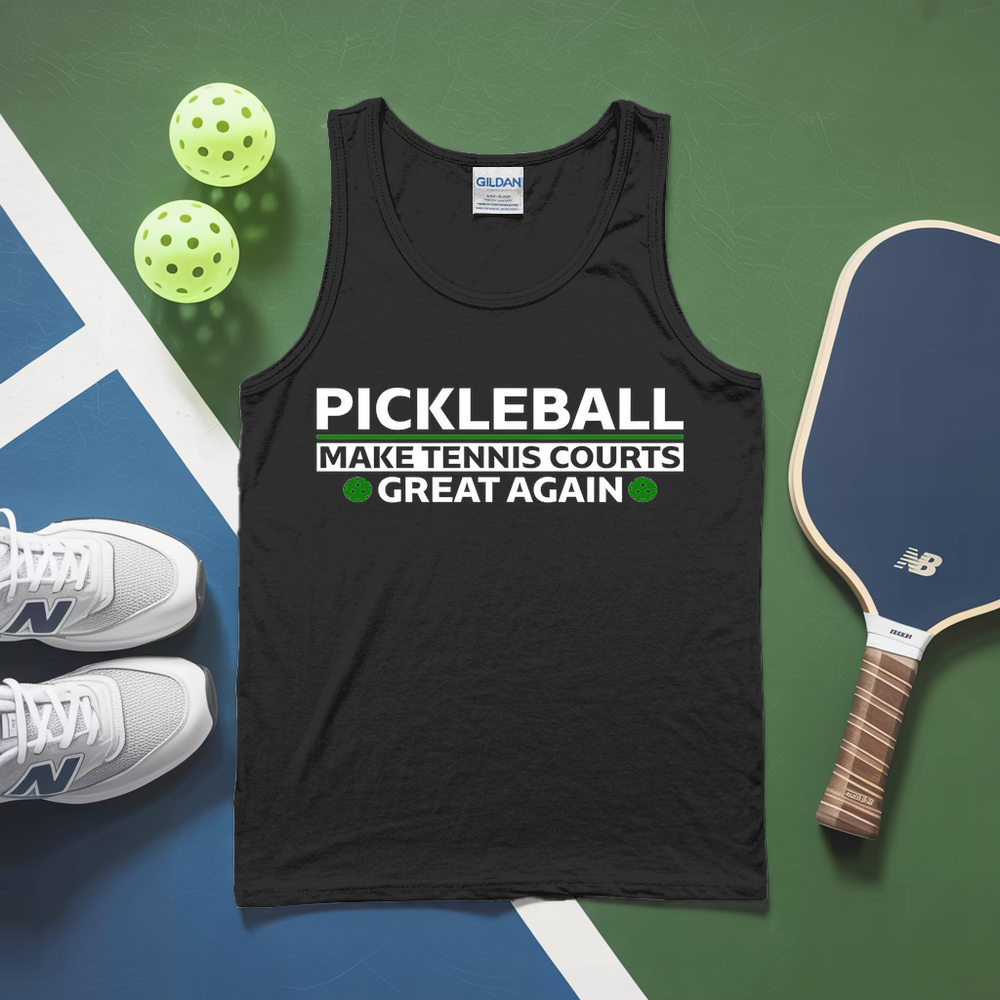 Black tank top with pickleball-themed text on a green and blue surface with pickleballs and a paddle.