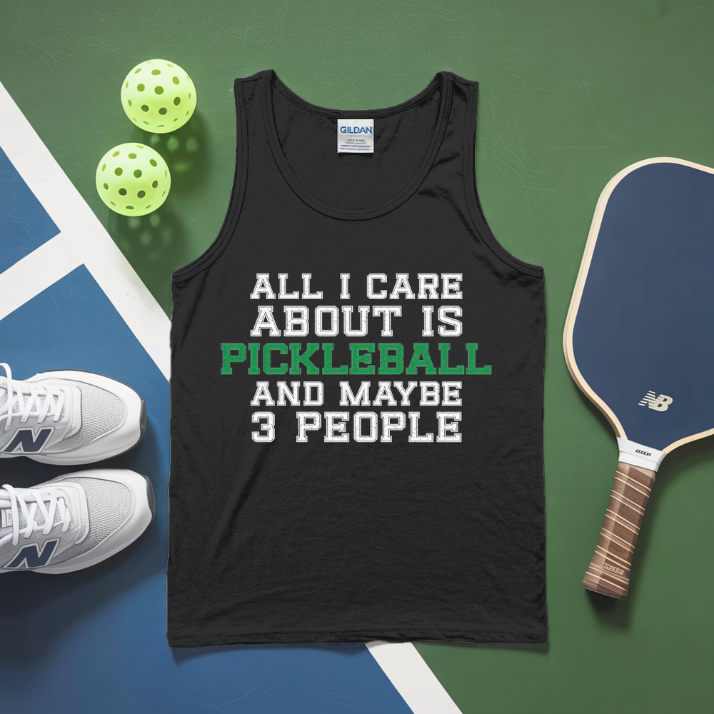 Black tank top with 'All I care about is Pickleball and maybe 3 people' text, pickleballs, and a paddle on a green and blue background.