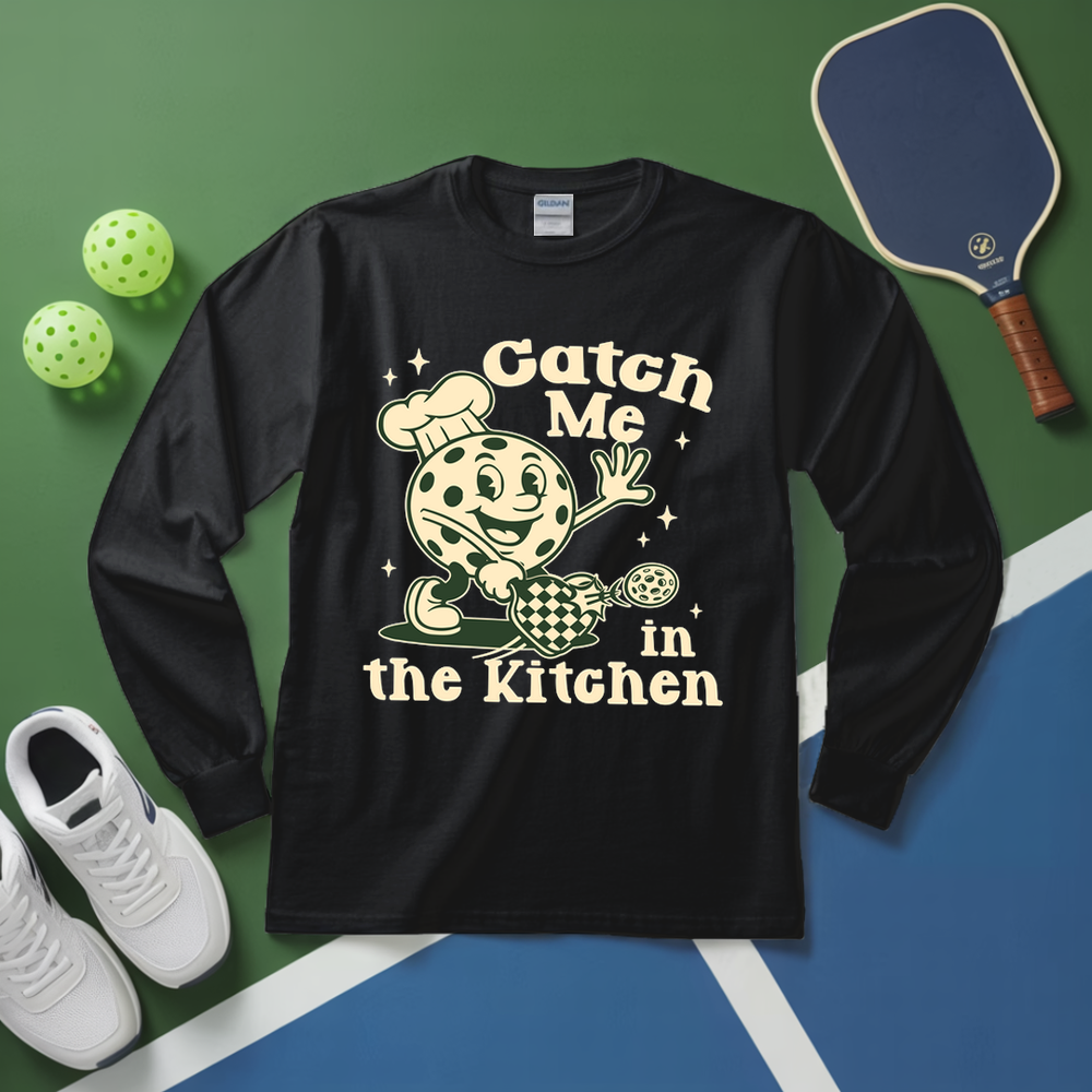 Black long-sleeve shirt with a graphic design and text on a green and blue background with sports equipment.