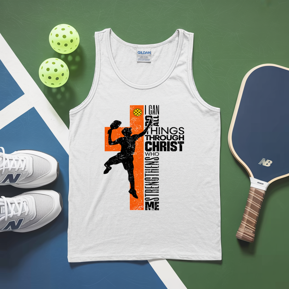 White tank top with motivational design, pickleball paddles, and balls on a green and blue background