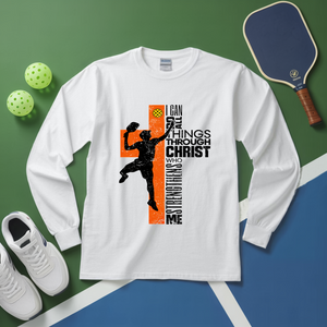 White long-sleeve shirt with graphic design on a green and blue surface with sports equipment.