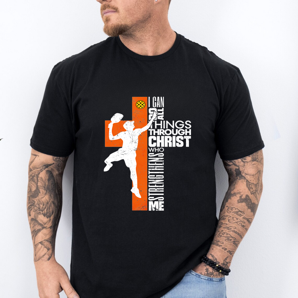 Person wearing a black t-shirt with a graphic design and text.
