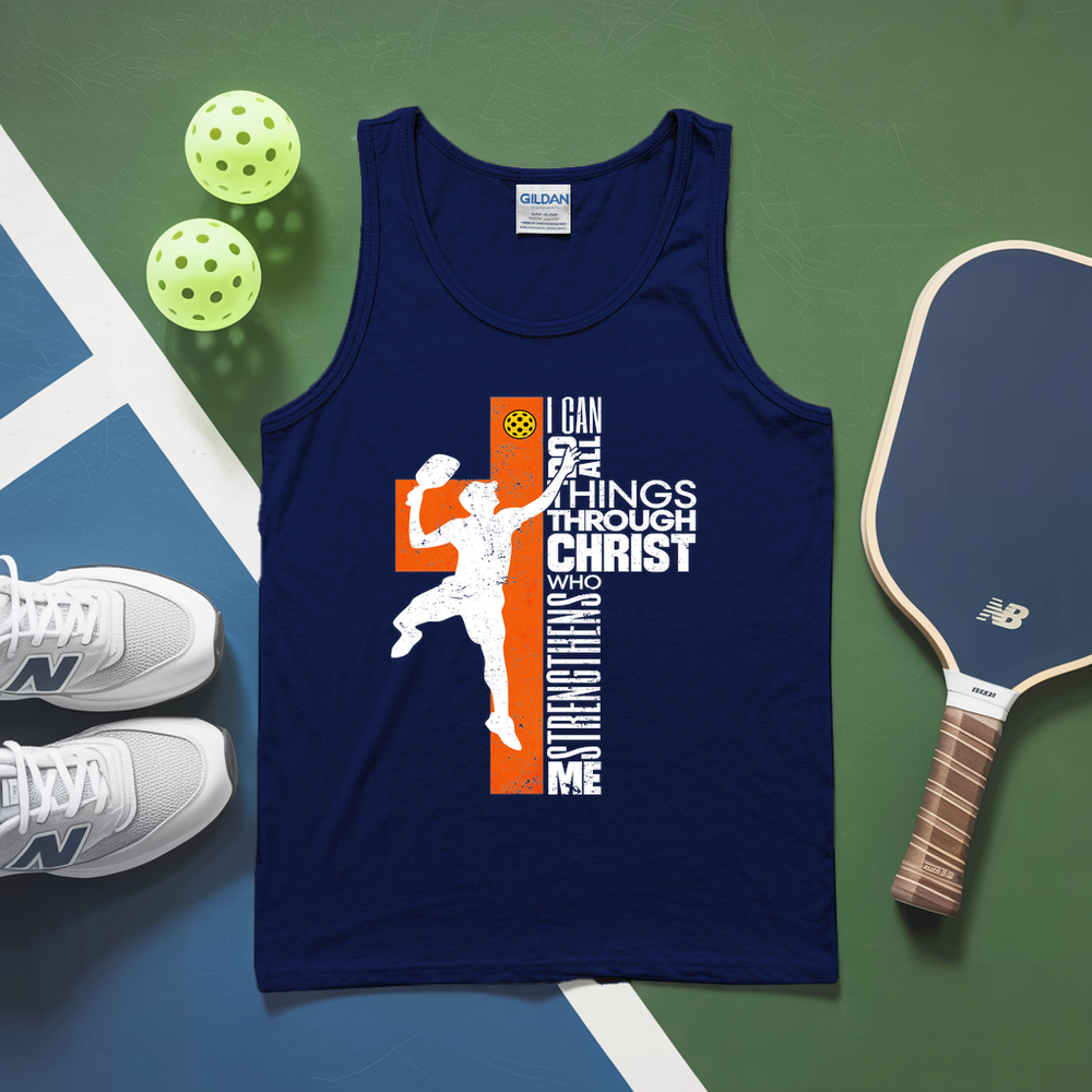 Navy tank top with motivational graphic on a sports-themed background with pickleball equipment.
