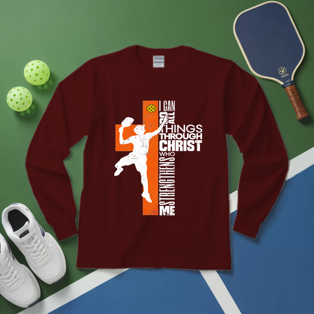 Maroon long-sleeve shirt with sports-themed design on a green and blue background with sports equipment.