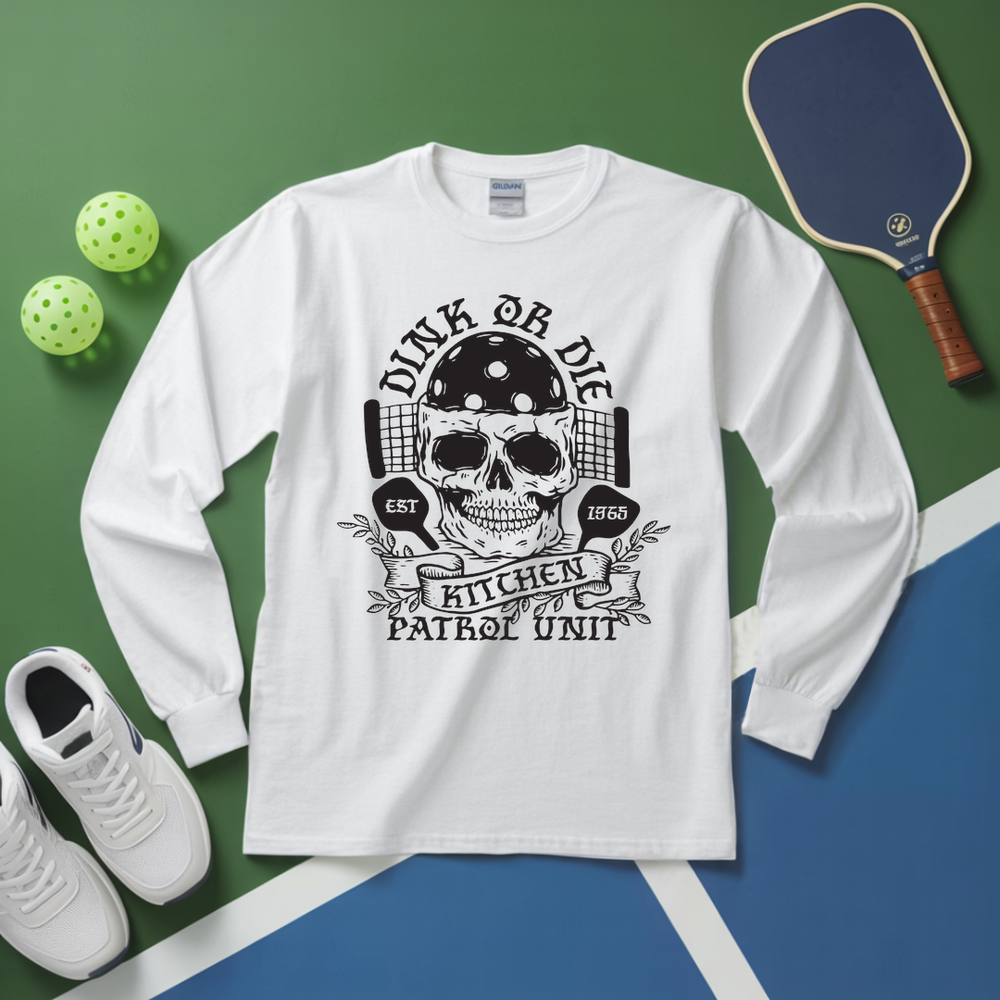 White long-sleeve shirt with skull graphic and text on a green and blue background with sports equipment.