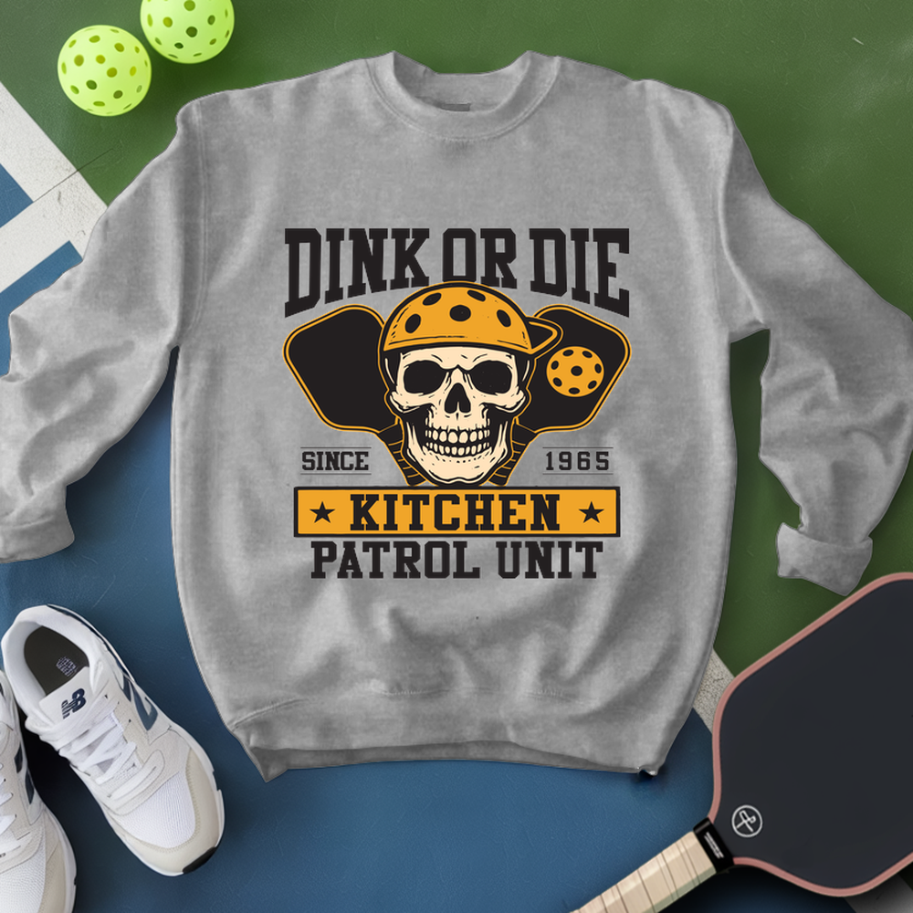 Gray sweatshirt with skull graphic and text on a green and blue background