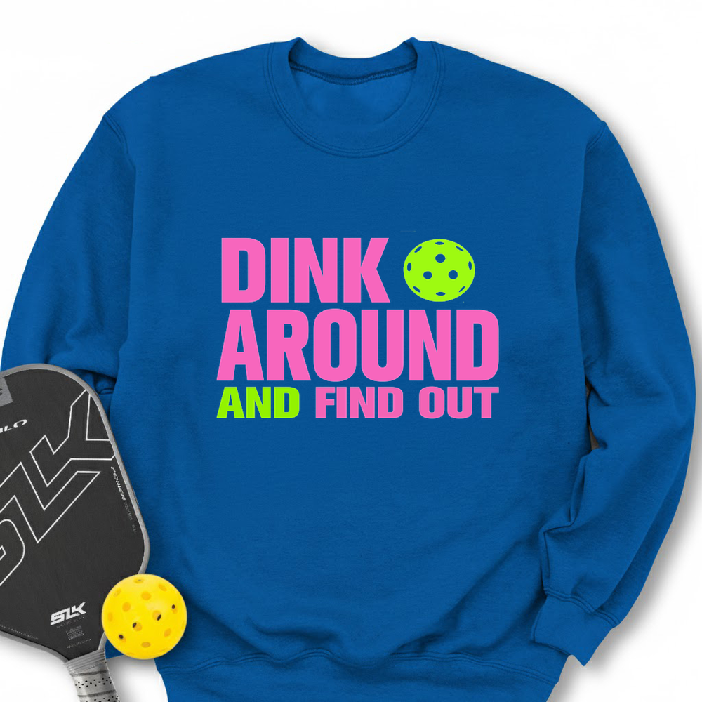Blue sweatshirt with 'Dink Around and Find Out' text and pickleball paddle and ball on a white background