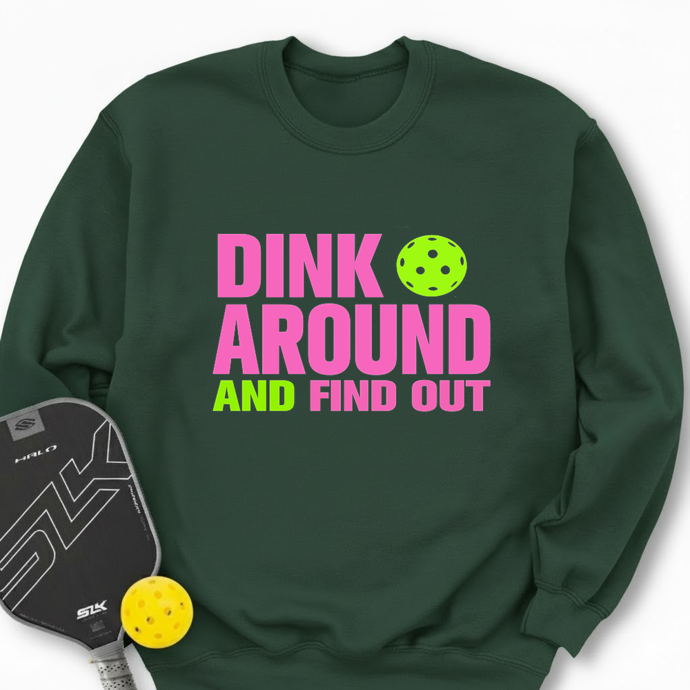 Green sweatshirt with 'Dink Around and Find Out' text and pickleball paddle and ball on a white background