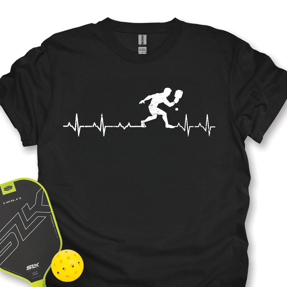 Black t-shirt with pickleball design and paddle and ball on white background