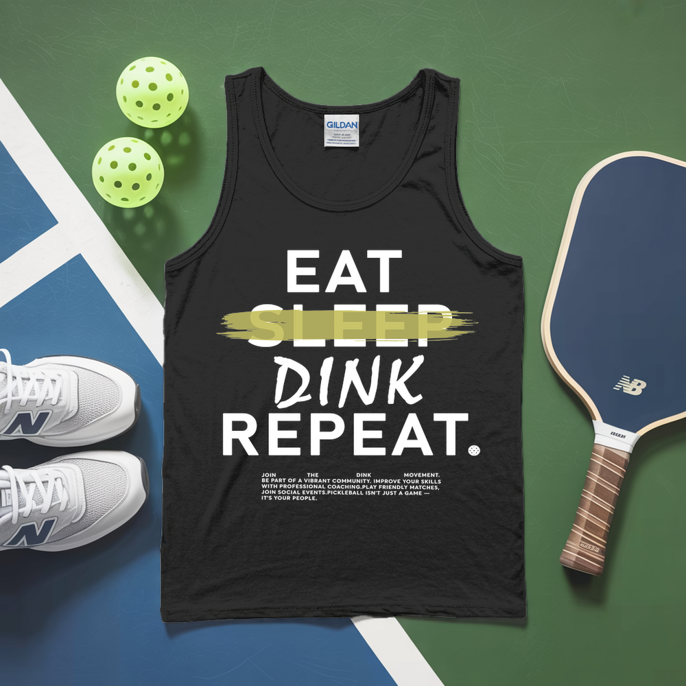 Black tank top with 'EAT SLEEP DINK REPEAT' text, pickleball paddles, and balls on a green and blue surface.