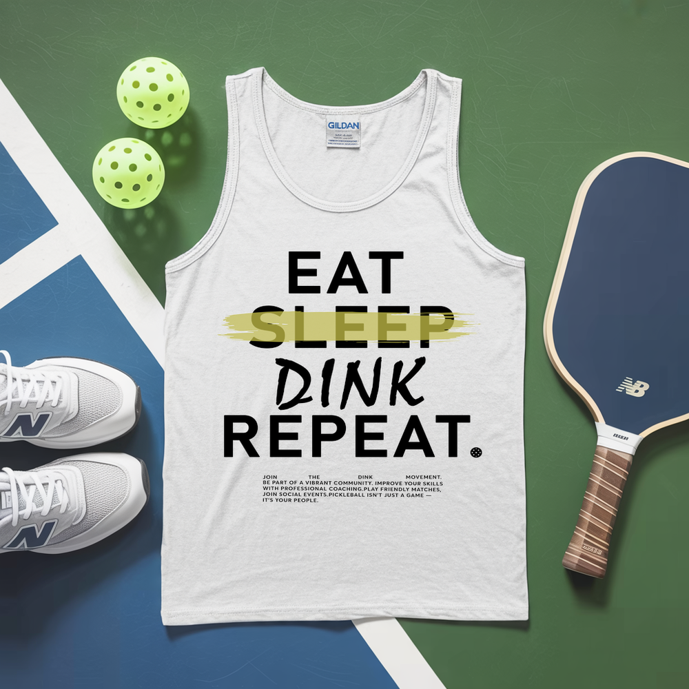 White tank top with 'EAT SLEEP DINK REPEAT' text, pickleball paddles, and balls on a green and blue background.