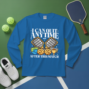 Blue long-sleeve shirt with pickleball-themed design on a green and blue background