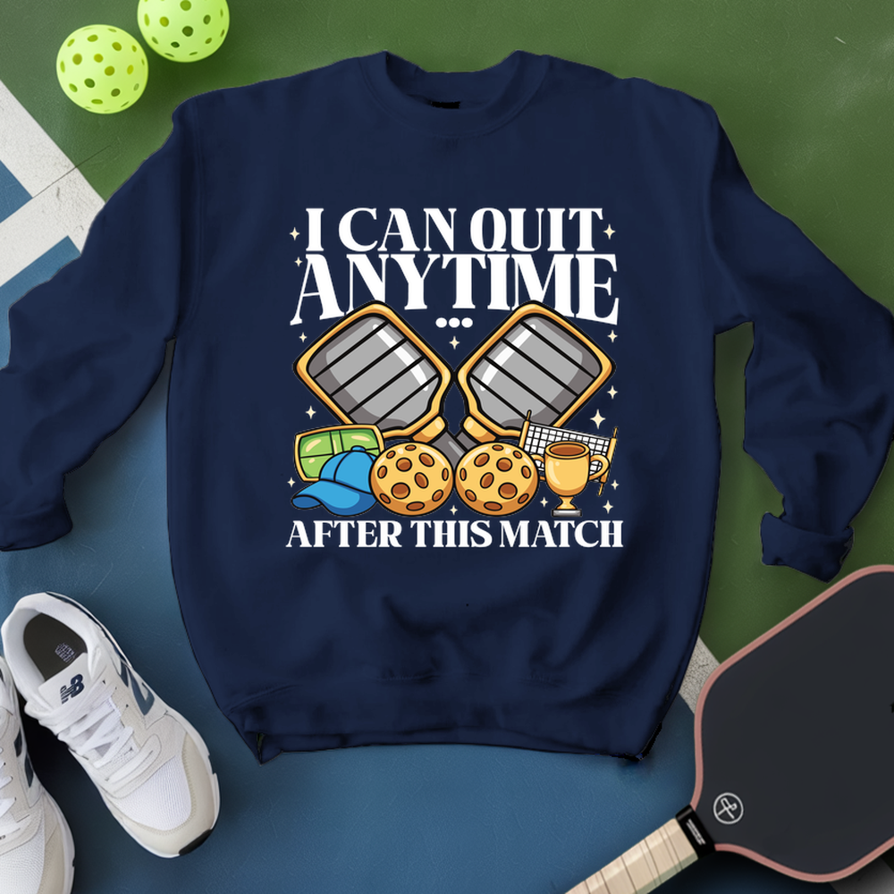 Navy blue sweatshirt with pickleball-themed graphic and text on a green and blue background.