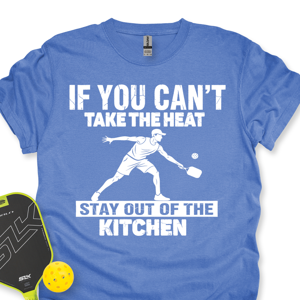 Blue t-shirt with white text and pickleball paddle and ball on a white background