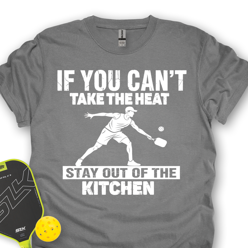 Gray t-shirt with a graphic of a person playing paddleball and text, next to a paddleball and paddle.