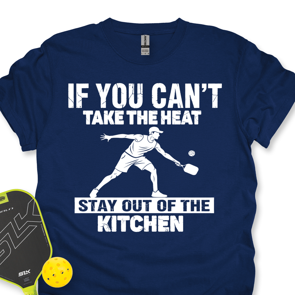 Navy blue t-shirt with white graphic and text, featuring a pickleball player, on a white background.