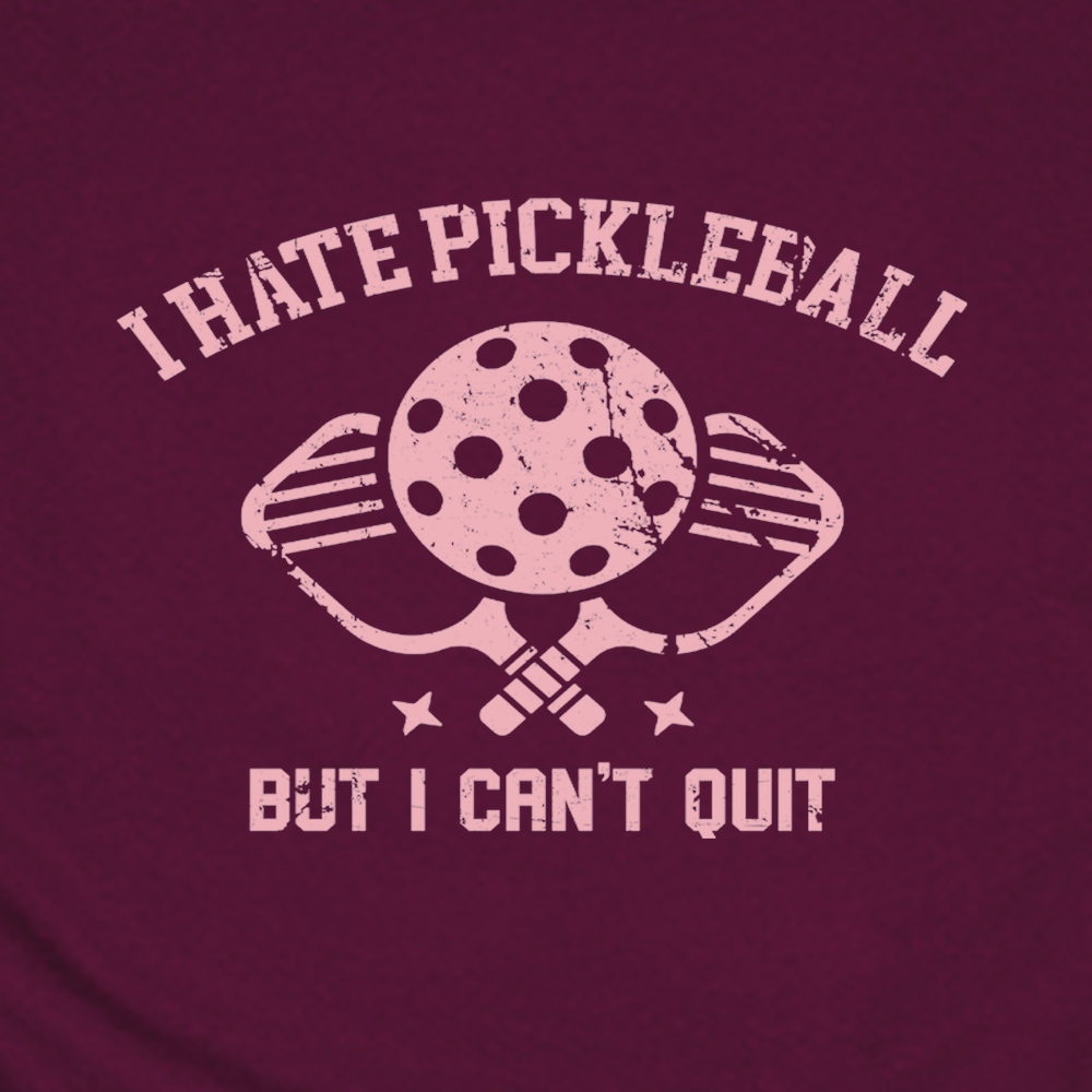 Maroon t-shirt with 'I Hate Pickleball But I Can't Quit' graphic and pickleball paddle and ball on a white background