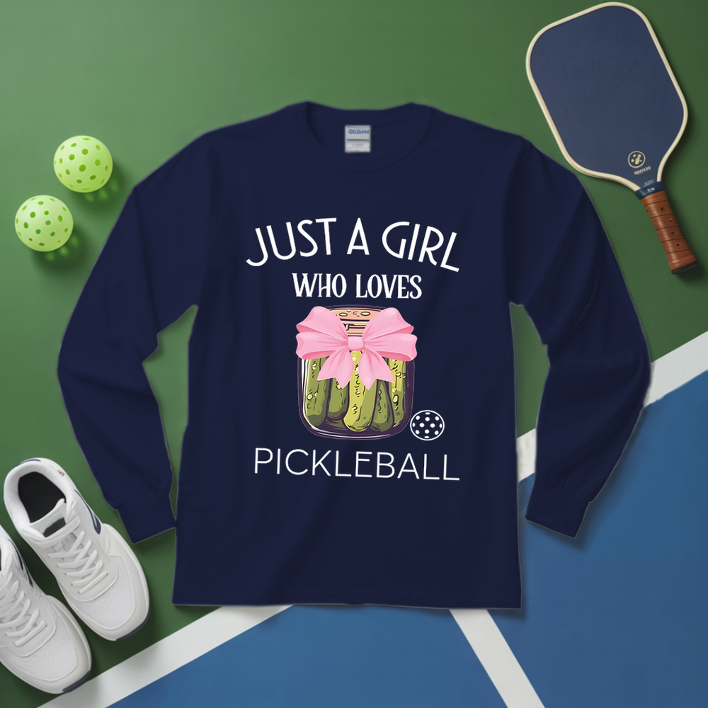 Navy blue sweatshirt with pickleball design and text on a green and blue background with pickleball equipment.