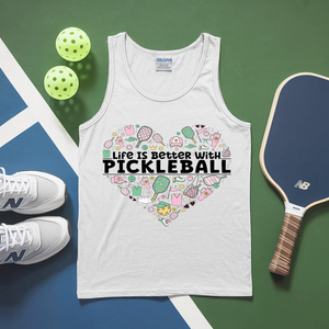 White tank top with pickleball-themed design and accessories on a green and blue background