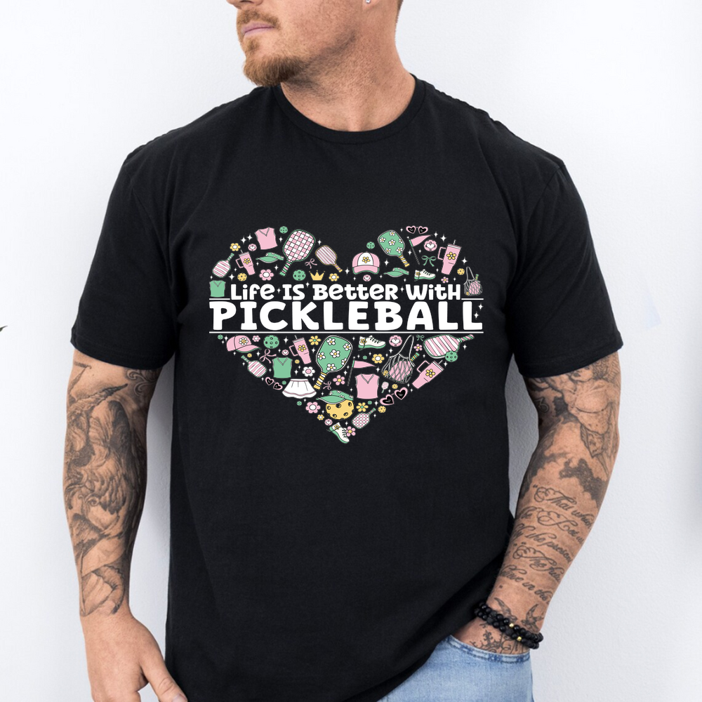 Person wearing a black t-shirt with 'Life is Better with Pickleball' design on a white background
