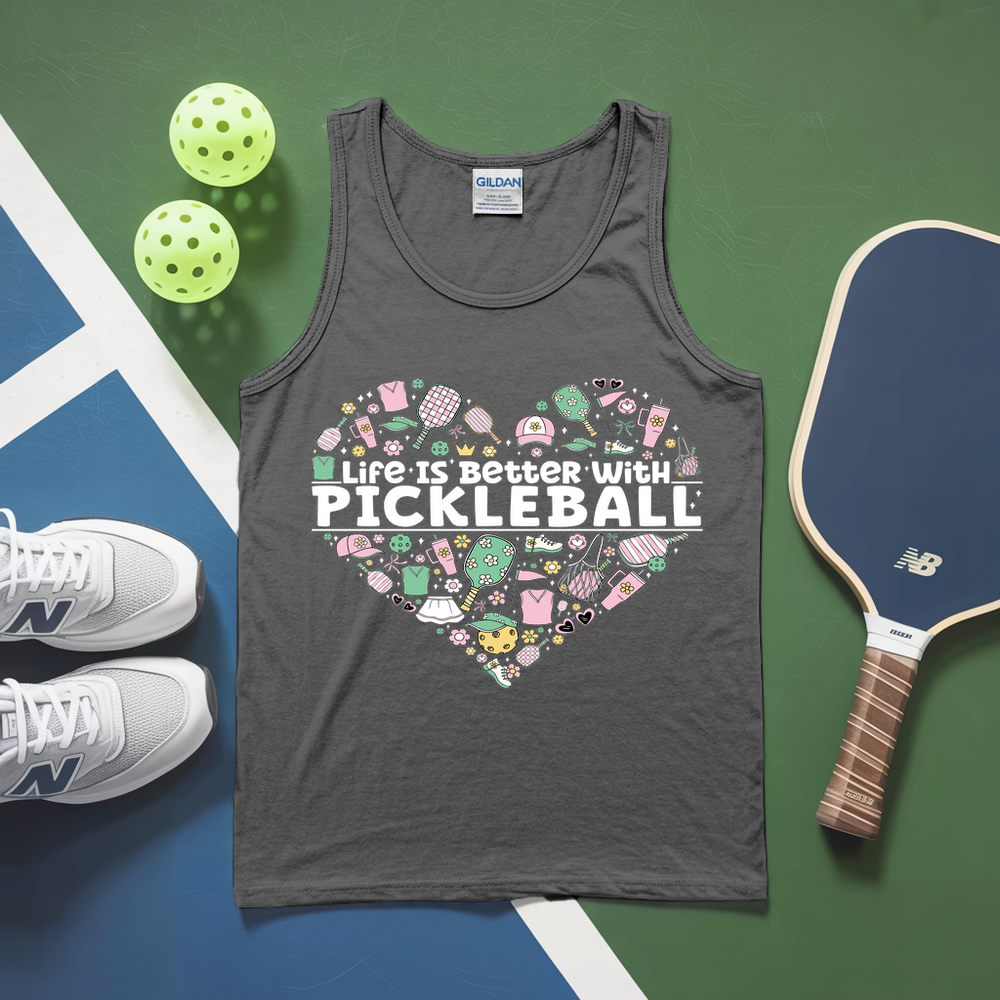Gray tank top with pickleball-themed design on a green and blue surface with pickleballs and a paddle.