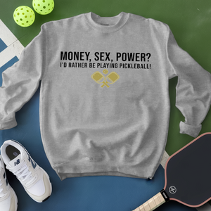 Gray sweatshirt with pickleball-themed text and graphics on a green and blue background with pickleballs and a paddle.