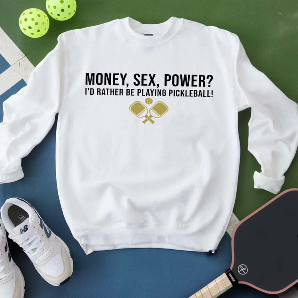White sweatshirt with pickleball-themed text and graphics on a green and blue background.