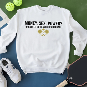 White sweatshirt with pickleball-themed text and graphics on a green and blue background.