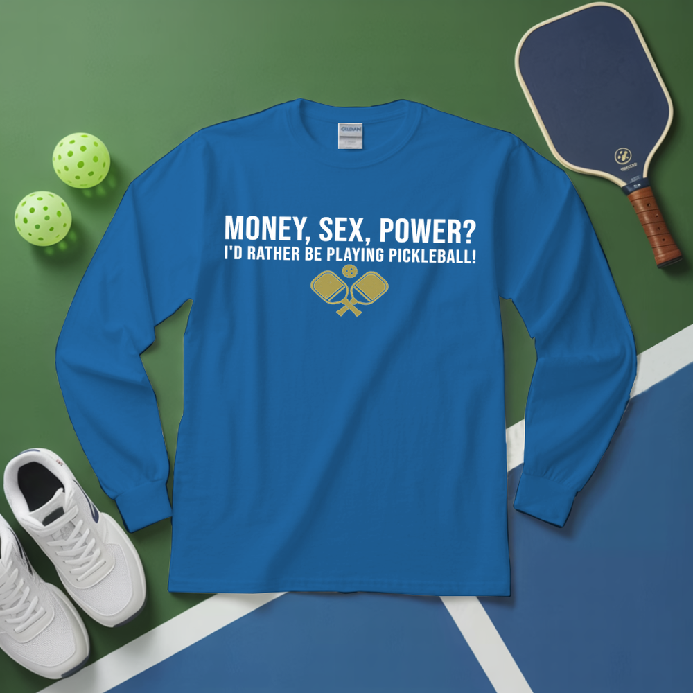 Blue long-sleeve shirt with pickleball-themed text and graphics on a green and blue background with pickleballs and a paddle.