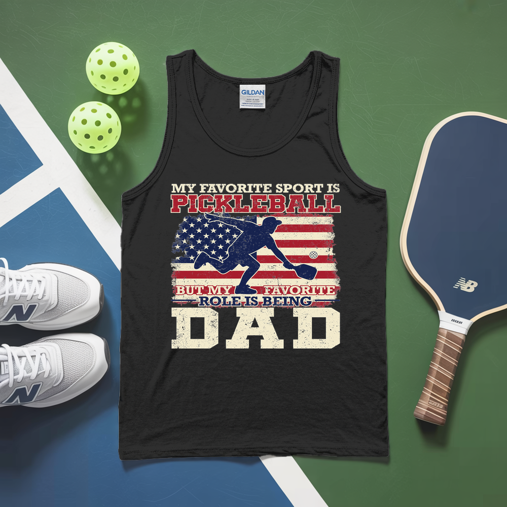 Black tank top with pickleball-themed design on a green and blue background with pickleballs and a paddle.