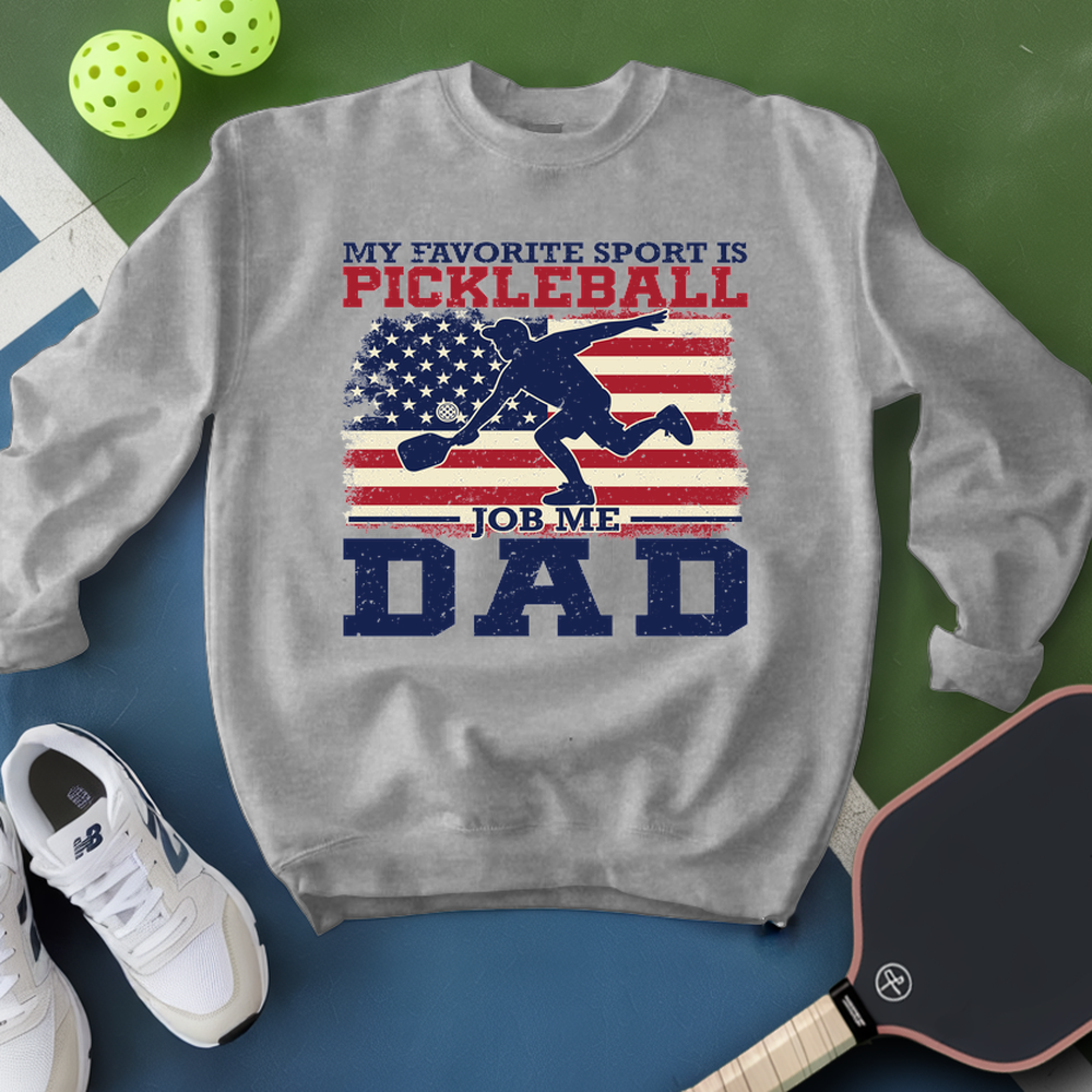 Gray sweatshirt with pickleball-themed design on a green and blue background