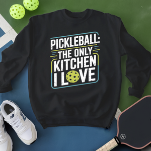 Black sweatshirt with pickleball-themed text on a blue and green background with pickleballs and a paddle.