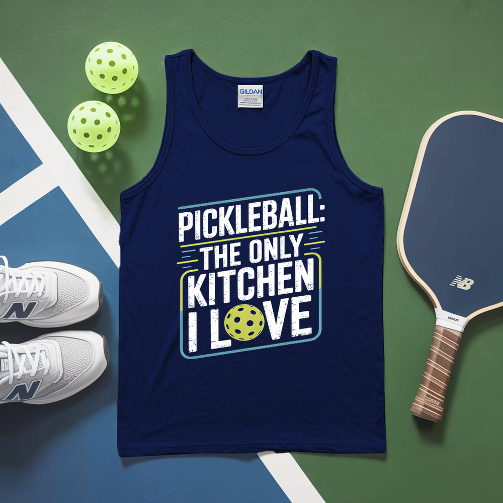 Blue tank top with pickleball-themed text on a green and blue surface with pickleballs and a paddle.