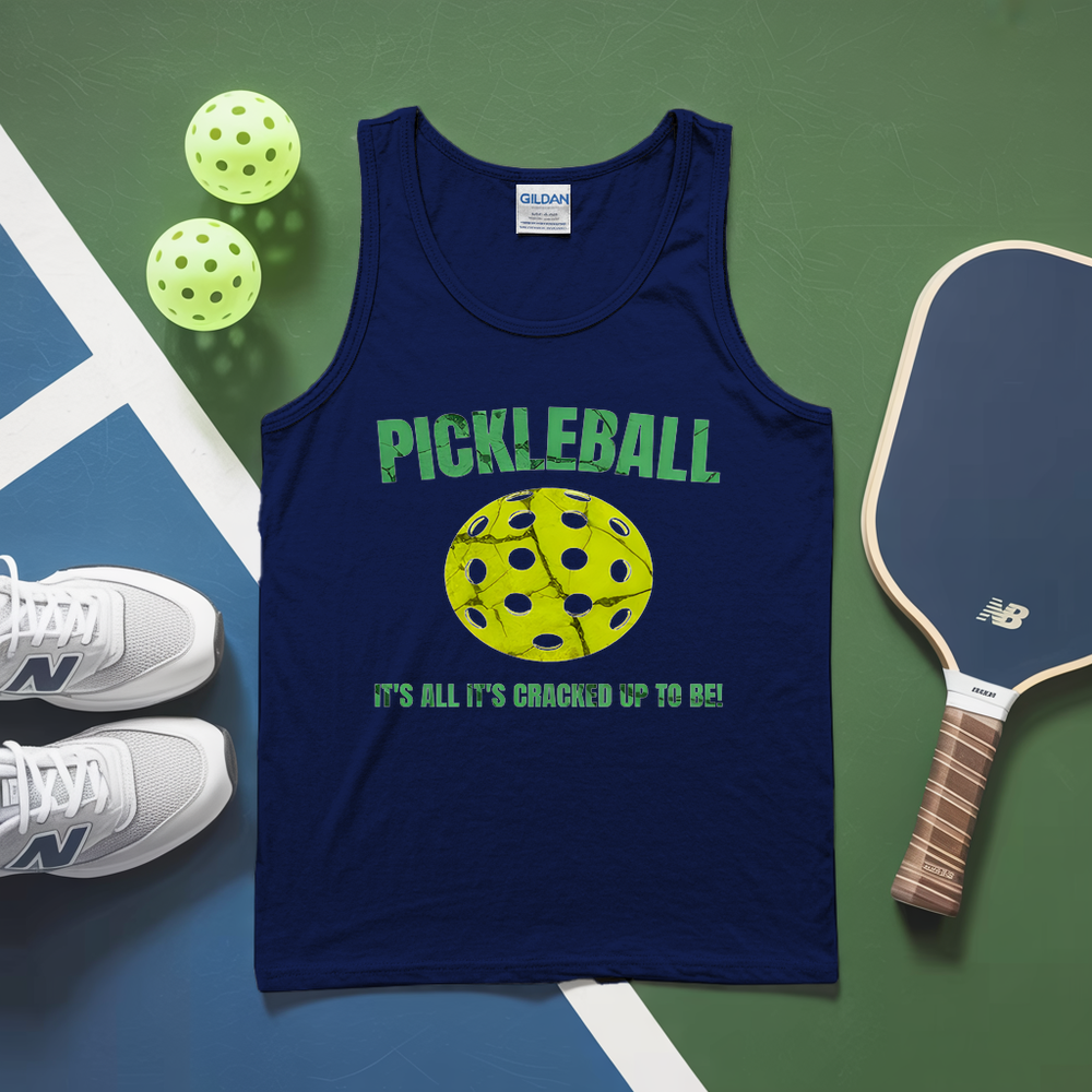 Blue tank top with pickleball design on a green and blue surface with pickleballs and paddle.