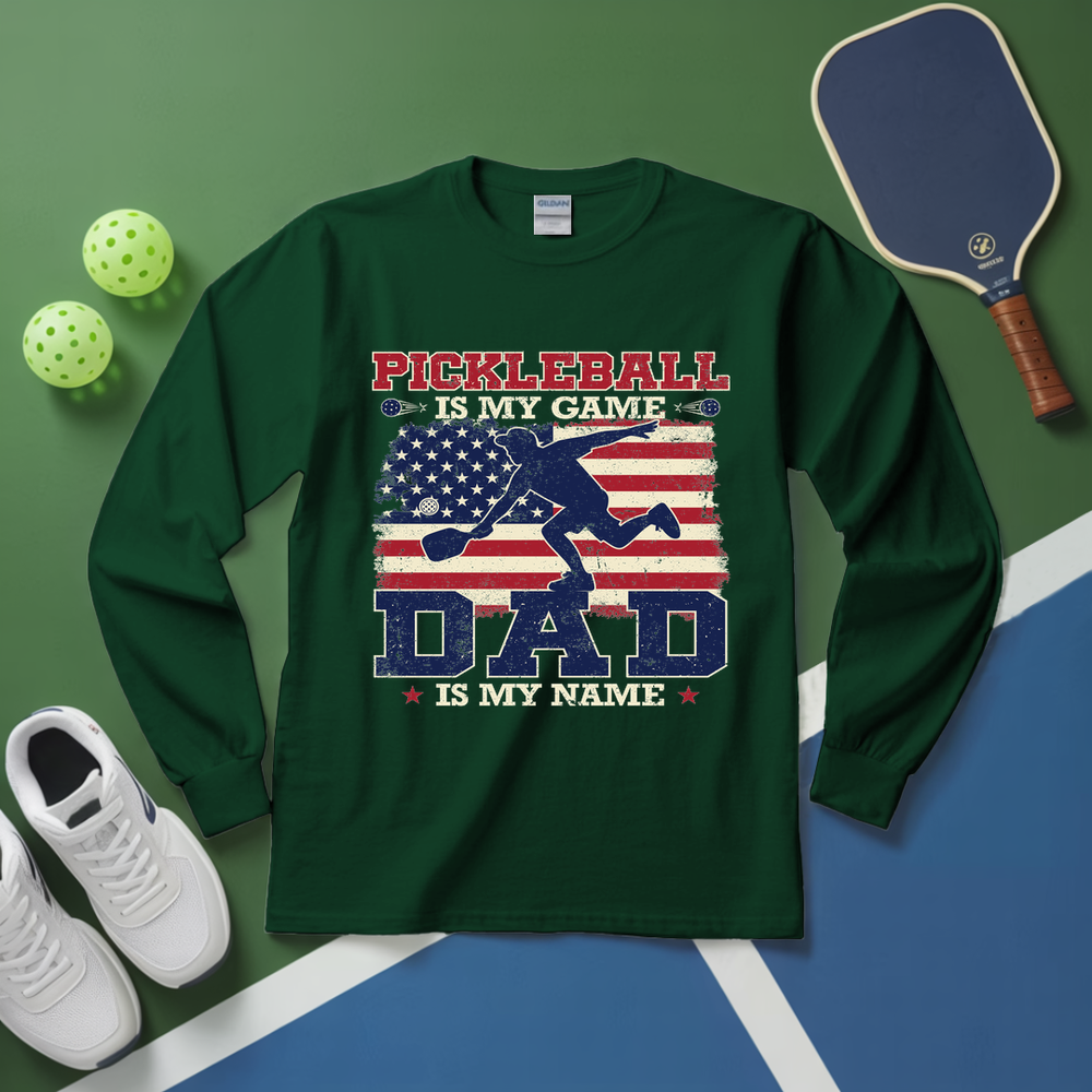 Green long-sleeve shirt with pickleball design on a green and blue background