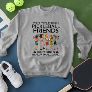 Gray sweatshirt with pickleball-themed design on a green and blue background
