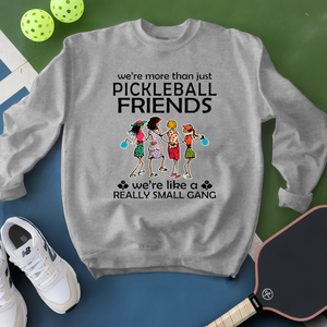 Gray sweatshirt with pickleball-themed design on a green and blue background