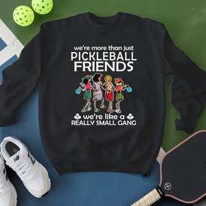 Black sweatshirt with pickleball-themed design on a blue and green background