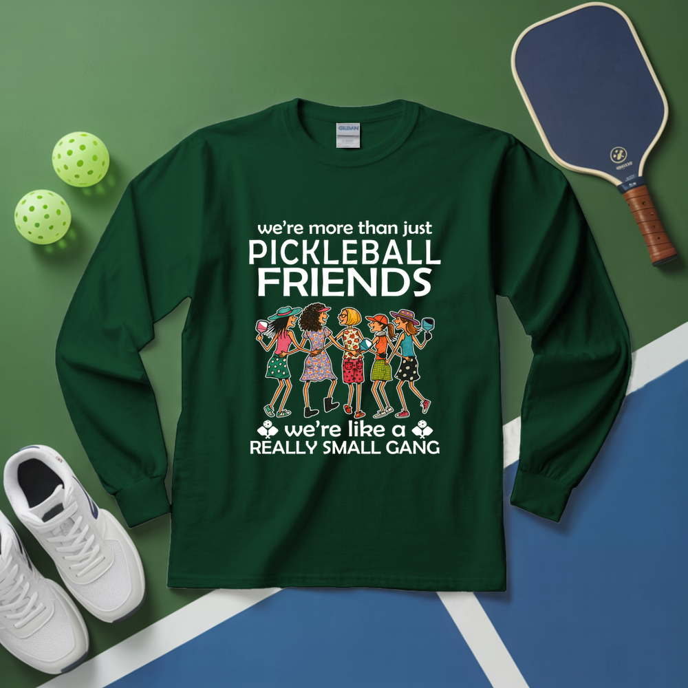 Green long-sleeve shirt with pickleball-themed design on a green and blue background with pickleballs and a paddle.