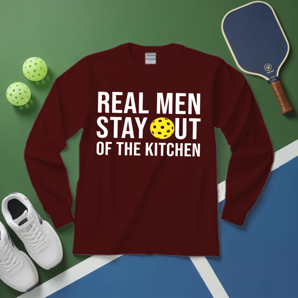 Maroon long-sleeve shirt with text on a green and blue surface with sports equipment.