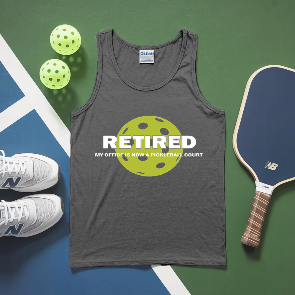 White tank top with 'RETired' design, pickleballs, and paddle on a green and blue background