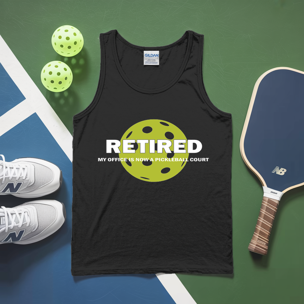 Black tank top with pickleball design and text, surrounded by pickleballs and a paddle on a green and blue background.