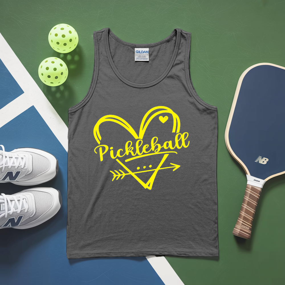 Gray tank top with yellow 'Pickleball' design on a green and blue surface with pickleballs and a paddle.