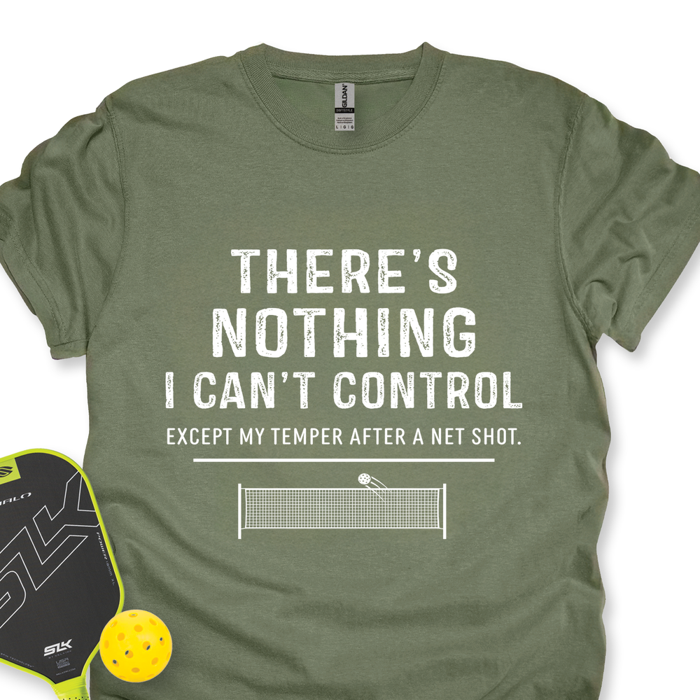 Green t-shirt with humorous pickleball quote and paddle and ball on a white background