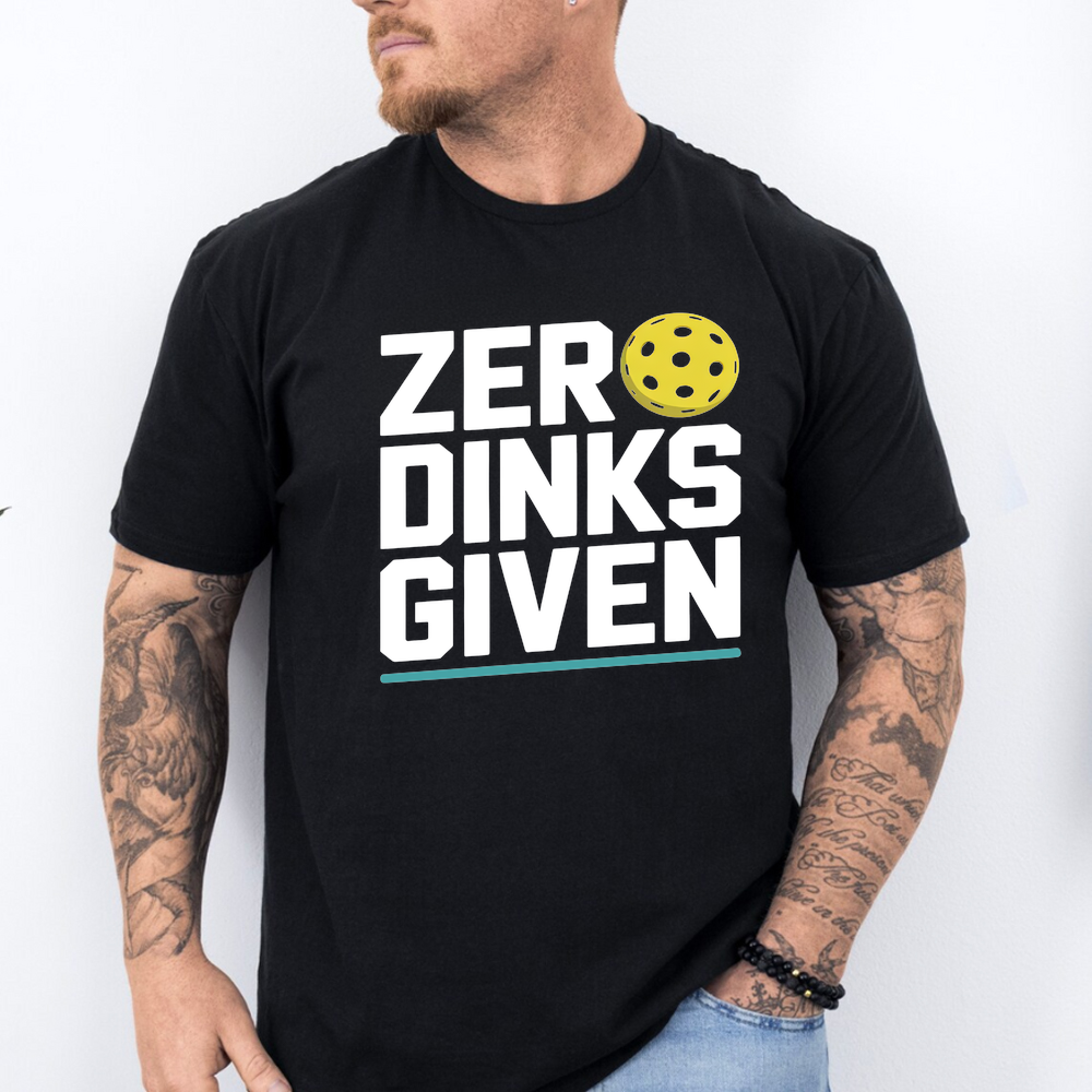 Person wearing a black t-shirt with 'Zero Dinks Given' text and pickleball graphic.