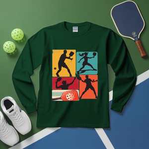Green long-sleeve shirt with pickleball design on a green and blue surface with pickleball equipment.