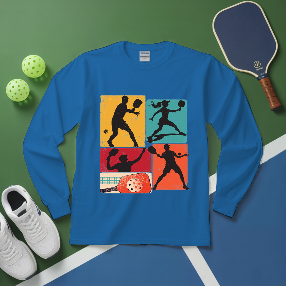 Blue long-sleeve shirt with pickleball graphics on a green and blue background