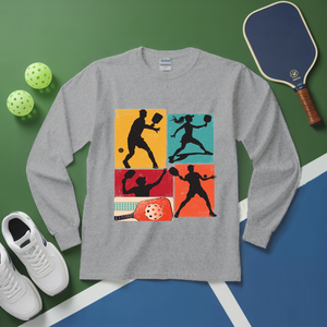 Gray long-sleeve shirt with pickleball design on a green and blue surface with pickleball equipment.